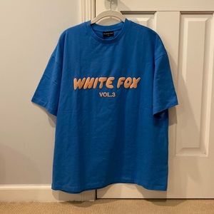 White Fox Offstage Oversized Tee - S/M. Azure blue with pink logo. New with tags